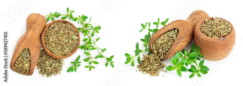 Dried thyme leaves in the wooden bowl and scoop, with fresh thyme isolated on white background. Top view