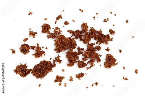 Dark muscovado sugar or Barbados sugar isolated on white background. Top view. Flat lay