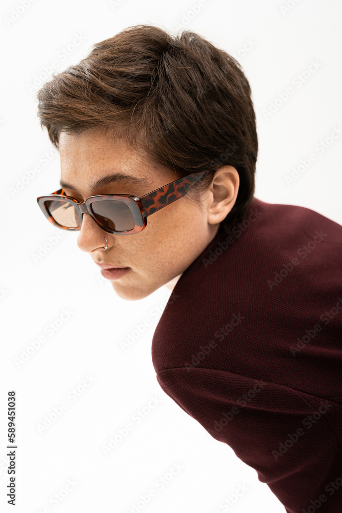 portrait of brunette woman in fashionable sunglasses isolated on white. portrait of brunette woman in fashionable sunglasses isolated on white.