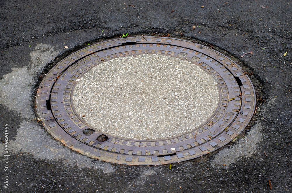 Manhole sewer in Germany on the road