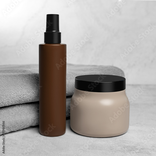 Natural beauty cosmetic products for skincare concept. Pure cosmetic in brown dispensers on a grey marble background.