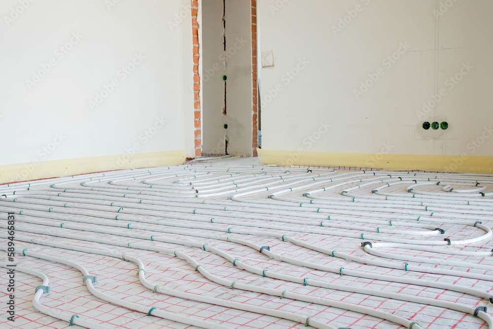 Installation of underfloor heating pipes for water heating. Heating