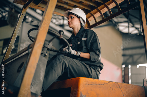A female robotic technician operates the folklift and schedules regular maintenance and repairs. A gender-neutral workplace in which all employees are honored and respected with low discrimination