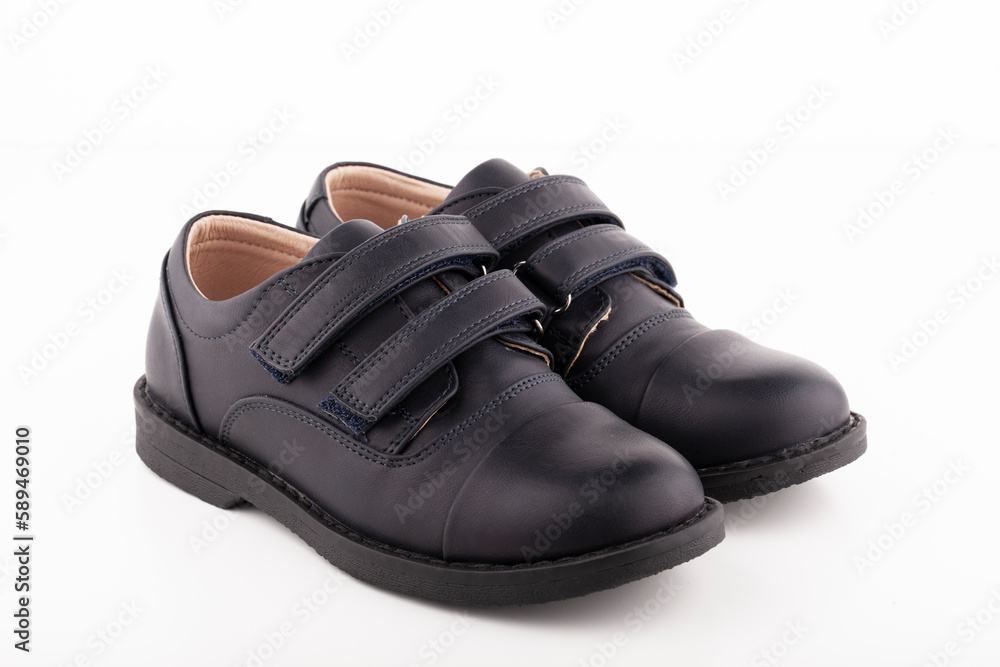 A pair of black leather shoes on a white background. A pair of black leather shoes on a white background.