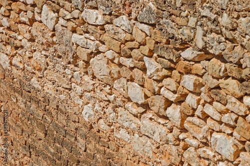 Stone wall texture background in Spain, Provinze of Valencia, City of Denia photo