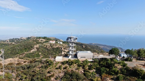 Drone shot of Topanga Microwave tower on a sunny day in Calabasas City, California, USA