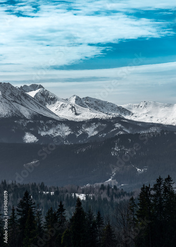 A beautiful view of the High Tatras from the Łapszanka pass. Mountain landscape in the environment. Tatra Mountains, Poland