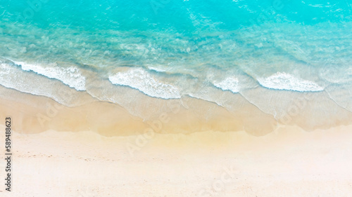 Aerial view with beach in wave of turquoise sea water shot  Top view of beautiful white sand background