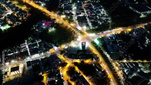 Aerial view of Saigon cityscape with heavy traffic at the intersection below showing the economic development of Vietnam in the 21st century