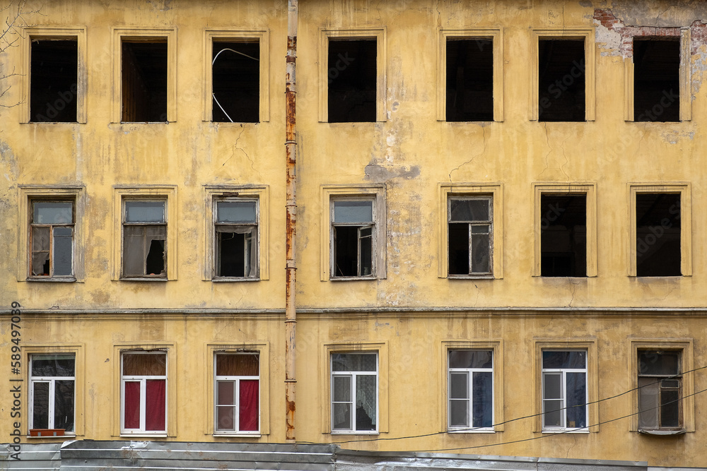 An old abandoned house without windows in St. Petersburg, prepared for reconstruction.