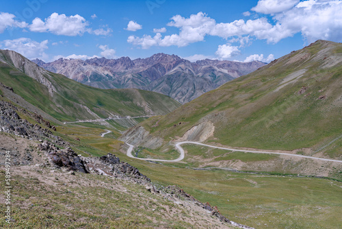 High mountain pass and mountains peaks, Tuluk valley, Naryn region, Kyrgyzstan