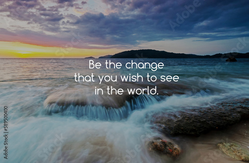 Beach sunset background with inspirational text - Be the change that you wish to see in the world photo