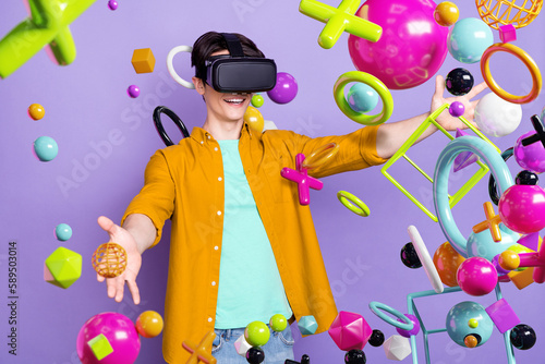 Artwork collage picture of excited guy use experience virtual reality goggles arms touch flying metaverse elements isolated on purple background