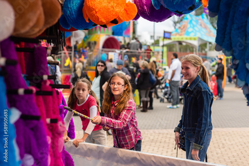 sisters at royal show in sideshow alley photo