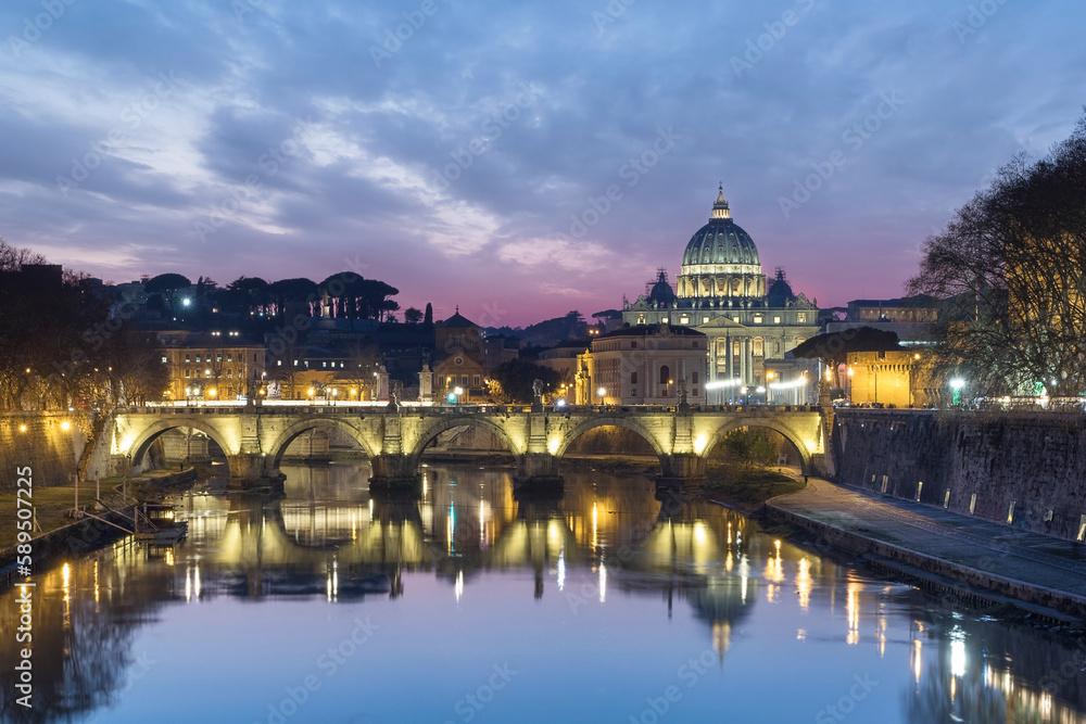 View of the Vatican City at sunset along the Tiber river in Rome downtown, Lazio, Italy. View of the Vatican City at sunset along the Tiber river in Rome downtown, Lazio, Italy.
