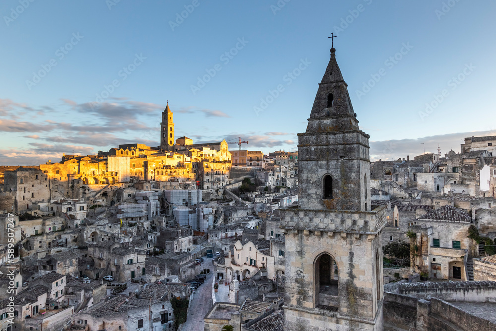 View of Matera old town at sunset in Basilicata, Italy. View of Matera old town at sunset in Basilicata, Italy.