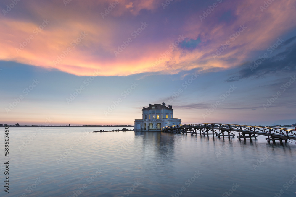 View of Fusaro Lake at sunset and the Casina Vanvitelliana, Bacoli, Naples, Italy. View of Fusaro Lake at sunset and the Casina Vanvitelliana, Bacoli, Naples, Italy.