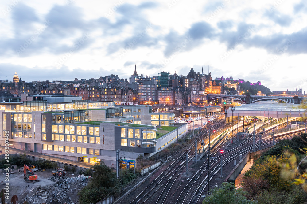 View of Waverley station with Edinburgh old town skyline at sunset, Scotland, United Kingdom. View of Waverley station with Edinburgh old town skyline at sunset, Scotland, United Kingdom.