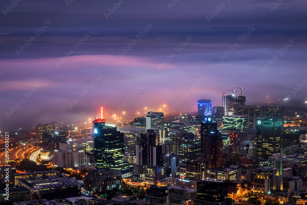 View of morning fog over Cape Town Central Business District, South Africa. View of morning fog over Cape Town Central Business District, South Africa.