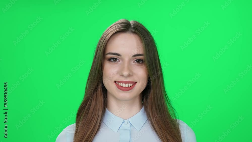Character, portrait of a cheerful caucasian woman looks at the camera and smiles, green background, chromakey. Character, portrait of a cheerful caucasian woman looks at the camera and smiles, green background, chromakey.