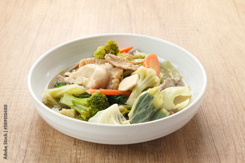 Capcay, stir fried vegetables with shrimp, meatballs and chicken. Served in white plate
Capcay, stir fried vegetables with shrimp, meatballs and chicken. Served in white plate
