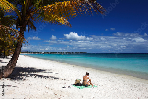 Girl on beach, Trou Aux Biches, Mauritius, Indian Ocean photo
