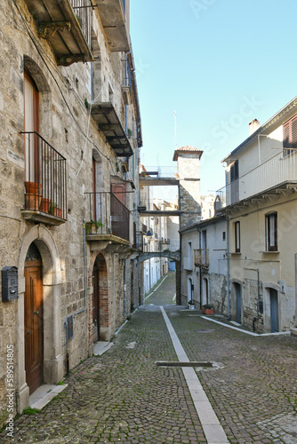 A narrow street among the old houses of Civitacampomarano  a historic town in the state of Molise in Italy.