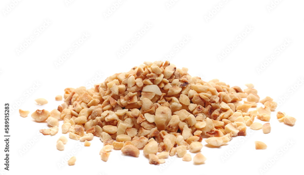 Pile chopped and roasted hazelnut isolated on white, side view Pile chopped and roasted hazelnut isolated on white, side view