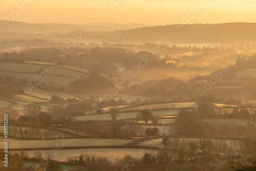 Winter dawn over Dartmoor countryside, Moretonhampstead, Devon photo