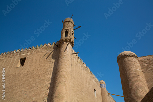 Tower, Outer Wall of Tosh HovIi Palace, Ichon Qala (Itchan Kala), UNESCO World Heritage Site, Khiva, Uzbekistan photo