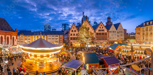 View of Christmas Market on Roemerberg Square from elevated position at dusk, Frankfurt am Main, Hesse, Germany photo