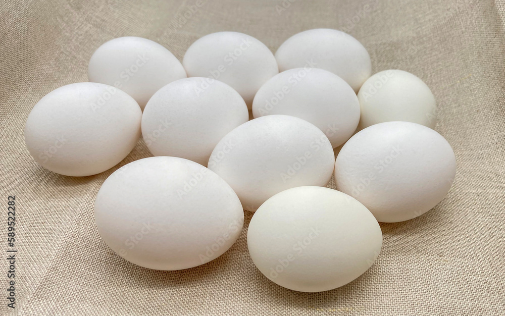 Farm eggs on linen cloth. Farm products. Natural eggs Farm eggs on linen cloth. Farm products. Natural eggs