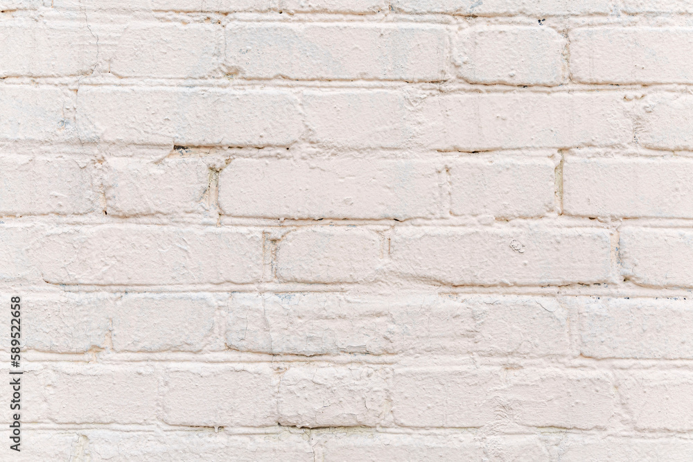 The surface of a light old brick wall. Close-up. Space for text. The surface of a light old brick wall. Close-up. Space for text.