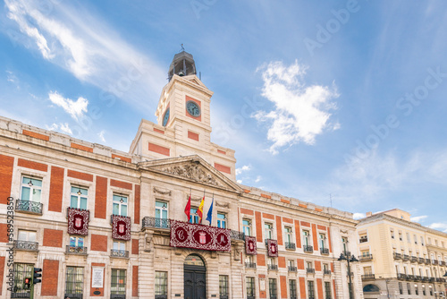 Puerta del sol square in Madrid, Spain with blue sky in Autumn