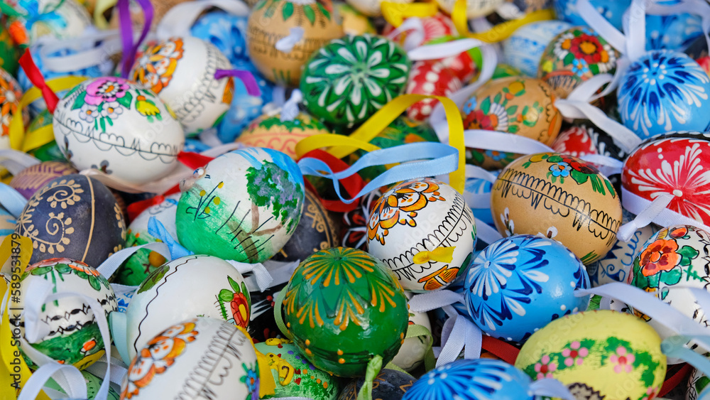Beautiful colorful decor for Easter. Traditional Easter painted colorful eggs. Selective focus.