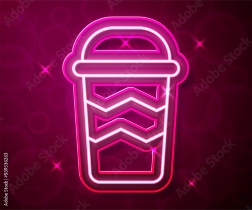 Glowing neon line Coffee cup to go icon isolated on red background. Vector