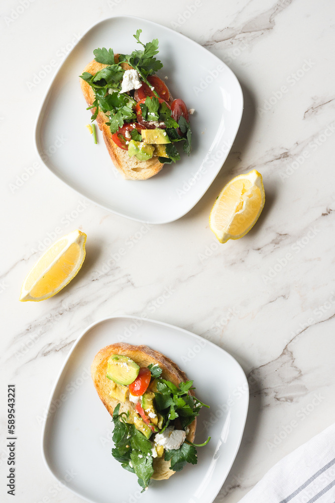 smashed avo on toast, with feta, tomatoes, parsley and lemon smashed avo on toast, with feta, tomatoes, parsley and lemon