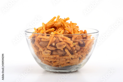 Deep fried salty dish - chivda or mixture made of gram flour and mixed with dry fruits. photo
