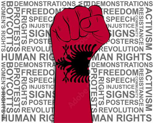 Raised fist on Albania flag, political news banner, victory or win concept, freedom symbol