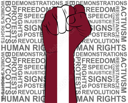 Raised fist on Latvia flag, political news banner, victory or win concept, freedom symbol