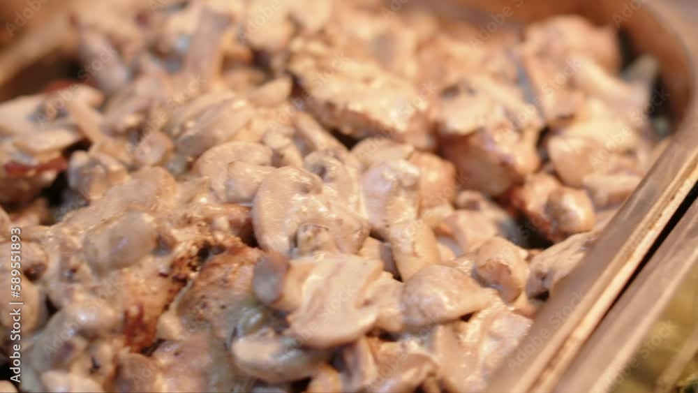 Juicy grilled chicken chunks bask in their savory juices on a warm day Juicy grilled chicken chunks bask in their savory juices on a warm day