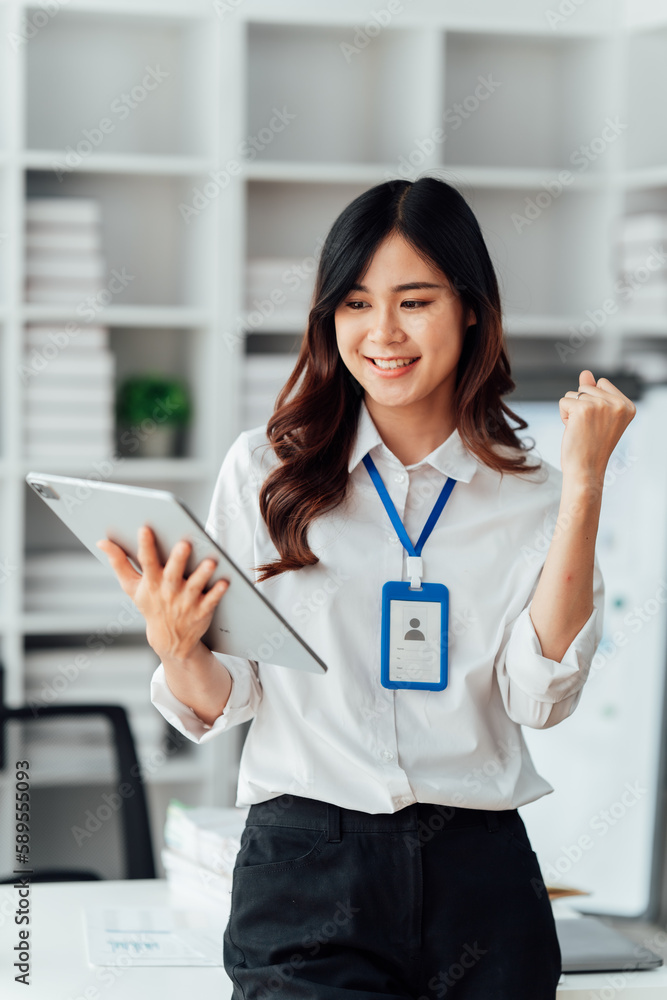Young woman happy and screaming because of problems with documents in the office. Young woman happy and screaming because of problems with documents in the office.