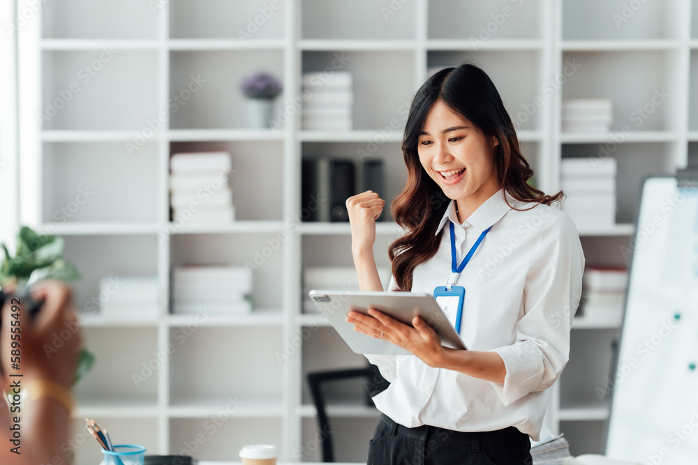 Young woman happy and screaming because of problems with documents in the office. Young woman happy and screaming because of problems with documents in the office.