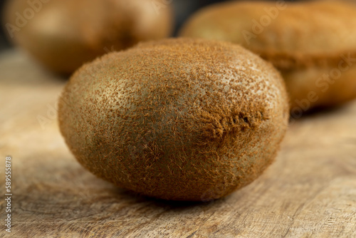 Whole ripe kiwi on the table