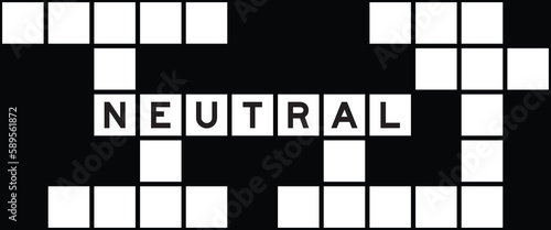 Alphabet letter in word neutral on crossword puzzle background