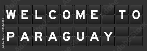 Black color analog flip board with word welcome to paraguay on gray background