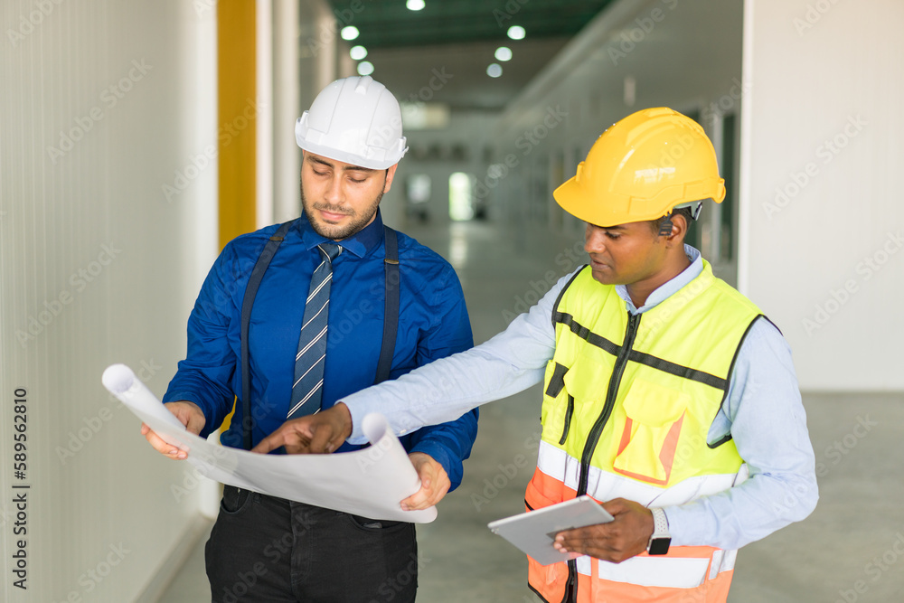 Construction engineers discussion with architects at construction site or building site. Construction engineers discussion with architects at construction site or building site.