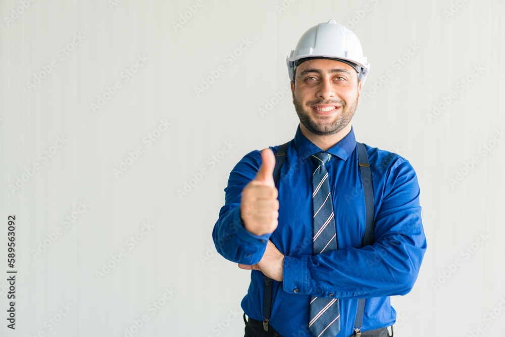 Engineer With Thumb Up Sign Isolated On Grey Background