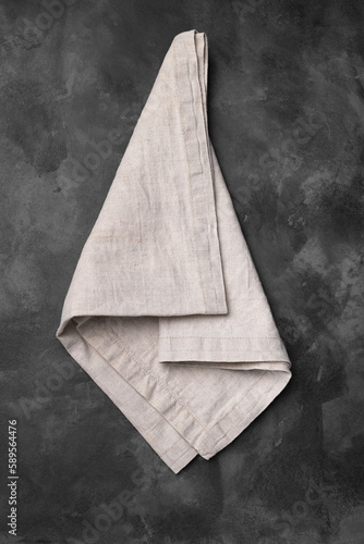 Fotografie Linen kitchen towel napkin or textile tablecloth fabric on gray concrete table background