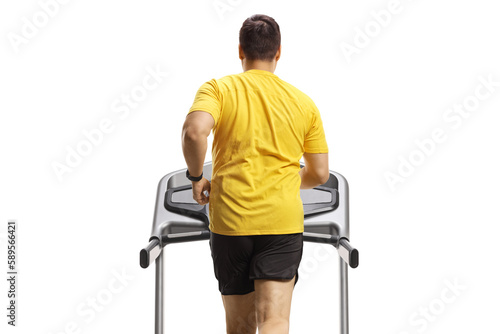 Rear shot of a man running on a treadmill